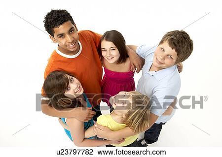 Stock Image - Group Of Five Young Children In Studio. Fotosearch