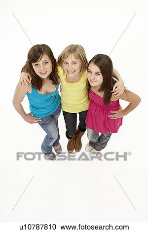 Group Of Three Young Girls In Studio View Large Photo Image Stock Image - Group Of Three Young Girls In Studio. Fotosearch