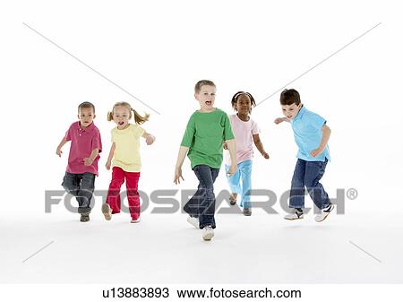 Stock Image - Group Of Young Children In Studio. Fotosearch