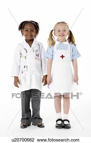 Stock Image - Group Of Young Children In Studio. Fotosearch