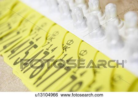 Identification Tags For Cattle View Large Photo Image Stock Photograph - Identification Tags For Cattle. Fotosearch