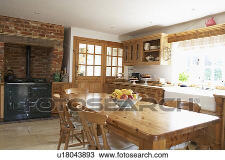 Stock Image - Interior Of Farmouse Kitchen. Fotosearch