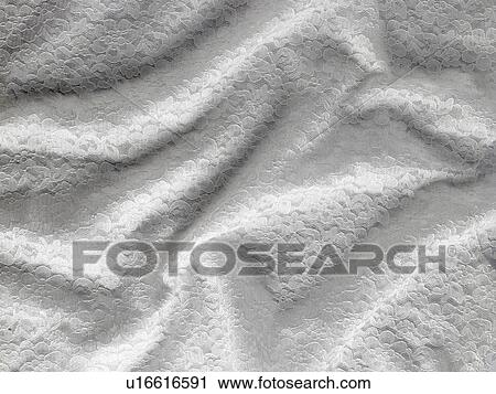 Stock Image - Lace Textile Background. Fotosearch