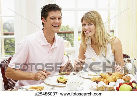 Middle Aged Couple Enjoying Hotel Breakfast View Large Photo Image Stock Photo - Middle Aged Couple Enjoying Hotel Breakfast. Fotosearch