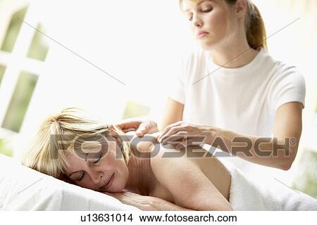 Middle Aged Woman Enjoying Massage View Large Photo Image Picture - Middle Aged Woman Enjoying Massage. Fotosearch
