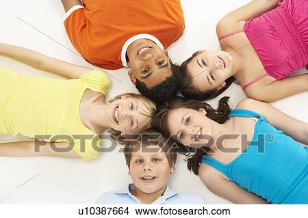 Overhead View Of Five Young Children In Studio View Large Photo Image Picture - Overhead View Of Five Young Children In Studio. Fotosearch