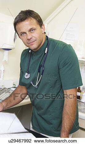 Portrait Of Male Vet In Surgery View Large Photo Image Stock Image - Portrait Of Male Vet In Surgery. Fotosearch