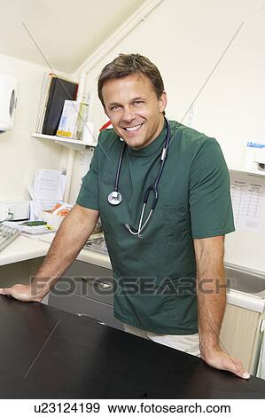 Stock Photo - Portrait Of Male Vet In Surgery. Fotosearch