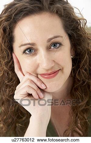 Stock Image - Portrait Of Smiling Woman. Fotosearch