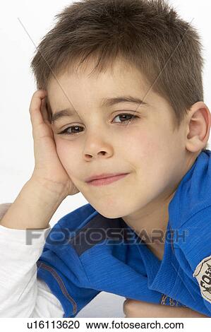 Stock Image - Portrait Of Smiling Young boy. Fotosearch