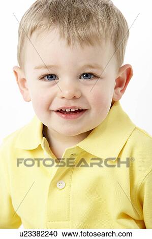 Stock Image - Portrait Of Smiling Young Boy. Fotosearch
