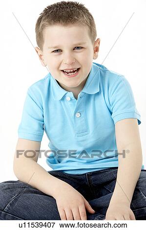 Portrait Of Smiling Young Boy View Large Photo Image Stock Photo - Portrait Of Smiling Young Boy. Fotosearch