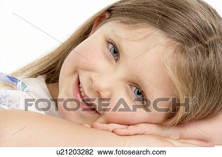Stock Image - Portrait Of Smiling Young Girl. Fotosearch