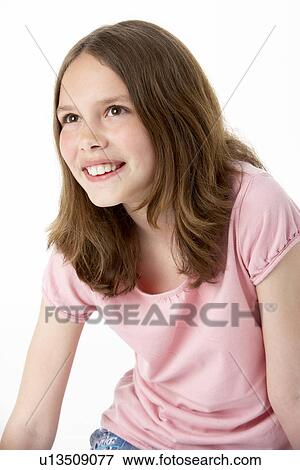 Portrait Of Smiling Young Girl View Large Photo Image Stock Photo - Portrait Of Smiling Young Girl. Fotosearch