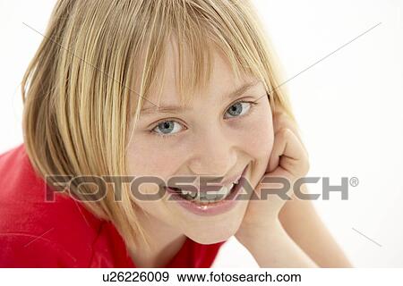 Portrait Of Smiling Young Girl View Large Photo Image Stock Photo - Portrait Of Smiling Young Girl. Fotosearch