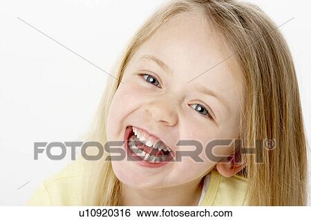 Stock Photograph - Portrait Of Smiling Young Girl. Fotosearch