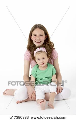Portrait Of Two Young Girls View Large Photo Image Stock Image - Portrait Of Two Young Girls. Fotosearch