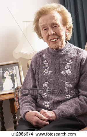 Senior Woman Relaxing At Home View Large Photo Image Picture - Senior Woman Relaxing At Home. Fotosearch