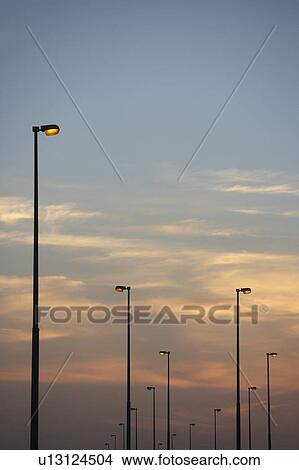 Street Lights At Dusk View Large Photo Image Picture - Street Lights At Dusk. Fotosearch