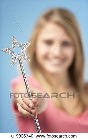 Teenage Girl Holding Fairy Wand View Large Photo Image Stock Image - Teenage Girl Holding Fairy Wand. Fotosearch