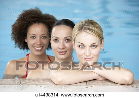 Three Female Friends In Swimming Pool View Large Photo Image Picture - Three Female Friends In Swimming Pool. Fotosearch