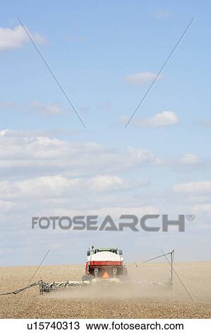 Tractor Planting Seed In Field View Large Photo Image Stock Image - Tractor Planting Seed In Field. Fotosearch