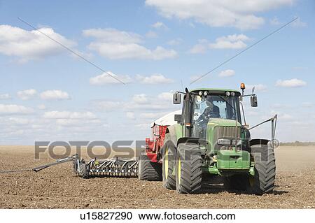 Tractor Planting Seed In Field View Large Photo Image Stock Image - Tractor Planting Seed In Field. Fotosearch