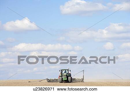 Tractor Planting Seed In Field View Large Photo Image Stock Image - Tractor Planting Seed In Field. Fotosearch