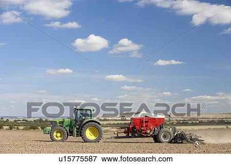 Tractor Planting Seed In Field View Large Photo Image Stock Photo - Tractor Planting Seed In Field. Fotosearch