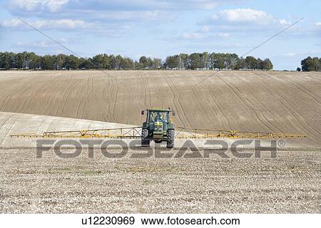 Tractor Spraying Field View Large Photo Image Stock Photo - Tractor Spraying Field. Fotosearch