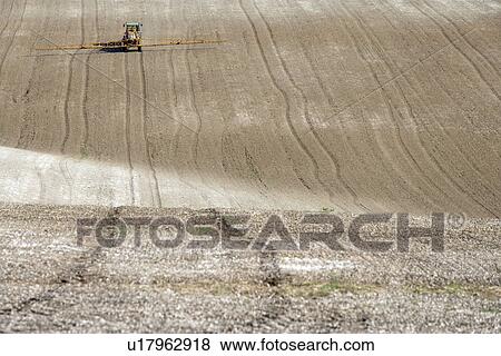 Tractor Spraying Field View Large Photo Image Stock Photo - Tractor Spraying Field. Fotosearch