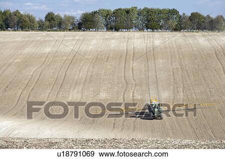 Tractor Spraying Field View Large Photo Image Stock Photo - Tractor Spraying Field. Fotosearch