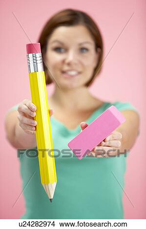 Woman Holding Big Pencil And Eraser View Large Photo Image Picture - Woman Holding Big Pencil And Eraser. Fotosearch