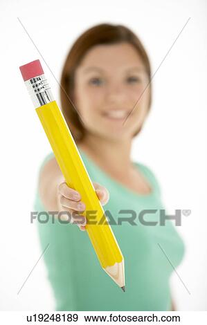 Woman Holding Big Pencil View Large Photo Image Stock Photo - Woman Holding Big Pencil. Fotosearch