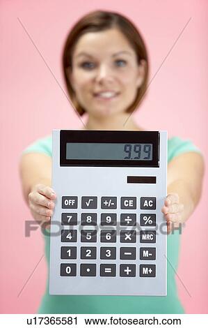 Woman Holding Calculator View Large Photo Image Stock Image - Woman Holding Calculator. Fotosearch