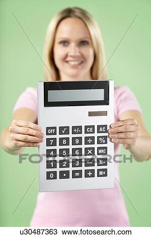 Woman Holding Calculator View Large Photo Image Stock Image - Woman Holding Calculator. Fotosearch