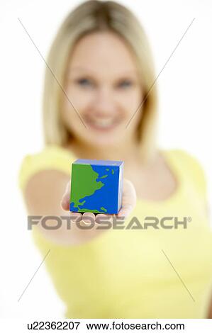 Woman Holding Cube Shaped Globe View Large Photo Image Stock Photo - Woman Holding Cube Shaped Globe. Fotosearch