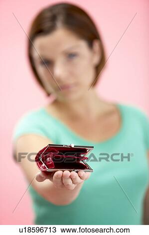 Woman Holding Empty Purse View Large Photo Image Stock Image - Woman Holding Empty Purse. Fotosearch