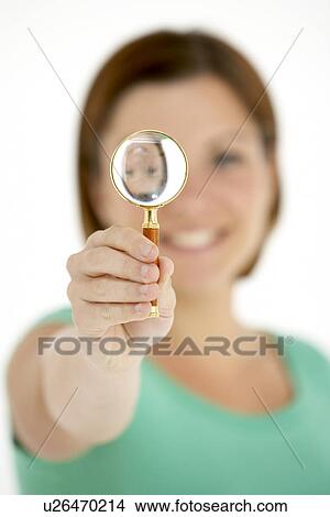 Woman Holding Magnifying Glass View Large Photo Image Picture - Woman Holding Magnifying Glass. Fotosearch