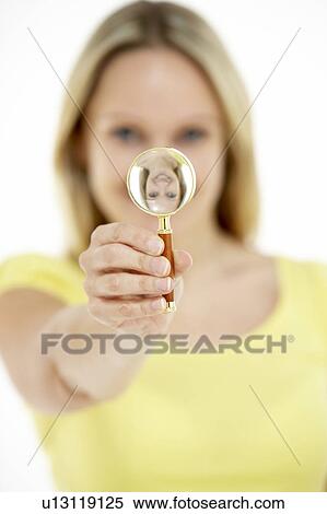 Woman Holding Magnifying Glass View Large Photo Image Stock Photography - Woman Holding Magnifying Glass. Fotosearch