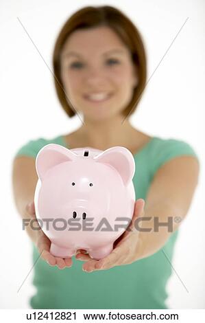 Woman Holding Piggy Bank View Large Photo Image Stock Image - Woman Holding Piggy Bank. Fotosearch