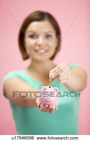 Woman Holding Piggy Bank View Large Photo Image Stock Photo - Woman Holding Piggy Bank. Fotosearch