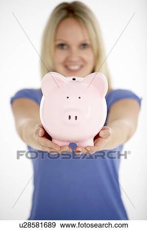 Woman Holding Piggy Bank View Large Photo Image Stock Photo - Woman Holding Piggy Bank. Fotosearch
