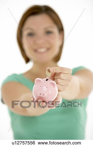 Woman Holding Piggy Bank View Large Photo Image Stock Photograph - Woman Holding Piggy Bank. Fotosearch