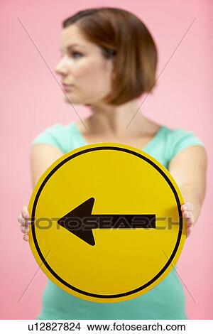 Woman Holding Road Traffic Sign View Large Photo Image Picture - Woman Holding Road Traffic Sign. Fotosearch