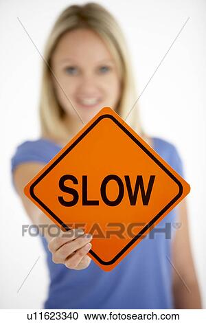 Woman Holding Road Traffic Sign View Large Photo Image Stock Image - Woman Holding Road Traffic Sign. Fotosearch