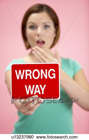 Woman Holding Road Traffic Sign View Large Photo Image Stock Image - Woman Holding Road Traffic Sign. Fotosearch