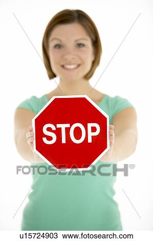Woman Holding Road Traffic Sign View Large Photo Image Stock Image - Woman Holding Road Traffic Sign. Fotosearch
