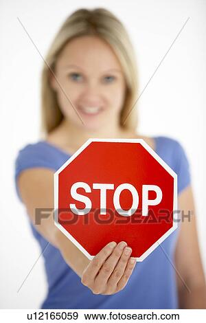 Woman Holding Road Traffic Sign View Large Photo Image Stock Photo - Woman Holding Road Traffic Sign. Fotosearch