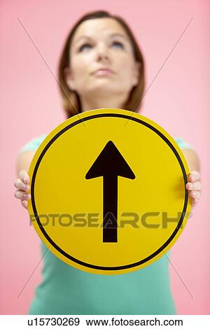 Woman Holding Road Traffic Sign View Large Photo Image Stock Photo - Woman Holding Road Traffic Sign. Fotosearch